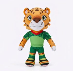 Boneco com  28 cm de altura e 16 cm de largura do Mascote da Copa do Mundo de Futebol de 2026
nome Zayu: uma onça-pintada que representa o México. Jogadora feminina na posição de atacante. 